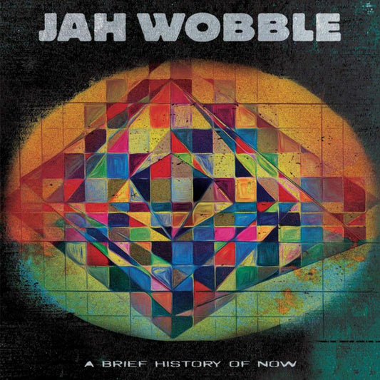 Jah Wobble album cover: colorful geometric design on a dark background.