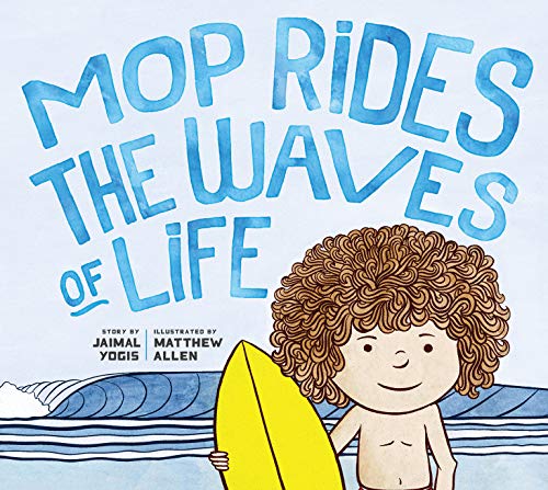 Child with curly hair holds a yellow surfboard against blue waves.