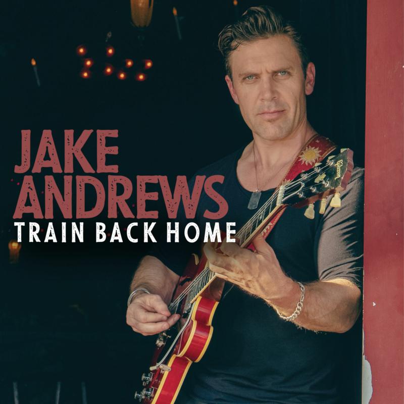 CD cover featuring Jake Andrews with a red electric guitar.