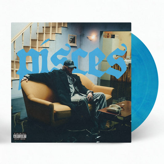 James Arthur’s “Pisces” album cover featuring a man on a yellow couch.