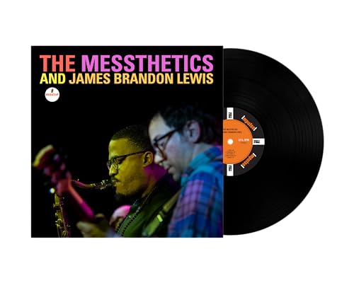 Vinyl record and album cover featuring two musicians, saxophone prominent.