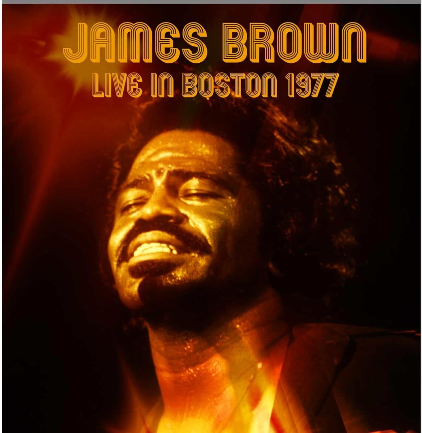 James Brown portrait on a 1977 live album CD cover, warm tones.