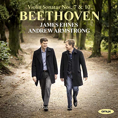 CD cover featuring two men walking on a forest path, with text overlay.