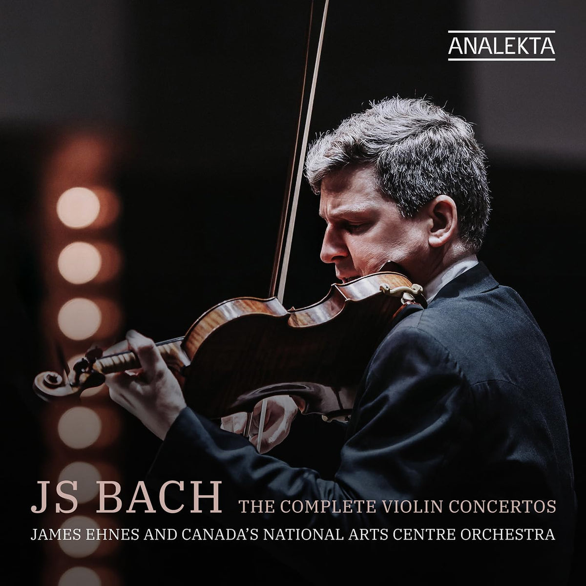 Violinist James Ehnes playing, album cover for J.S. Bach violin concertos.