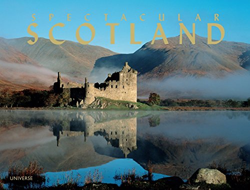 Ruined castle reflected in calm water, with misty mountains in background.