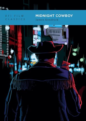 Cowboy seen from behind, standing in a brightly lit city at night.