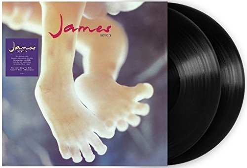 Vinyl record cover featuring baby feet with two black vinyl discs next to it.