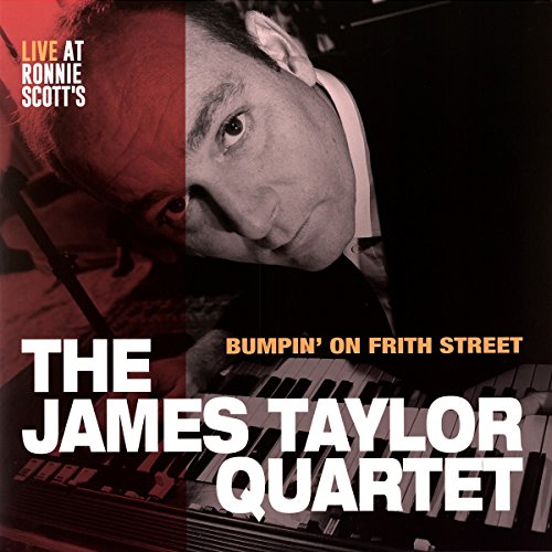 The image is a vinyl album cover featuring a man at a keyboard.