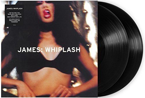 James’ “Whiplash” vinyl record with a woman’s face on the cover.