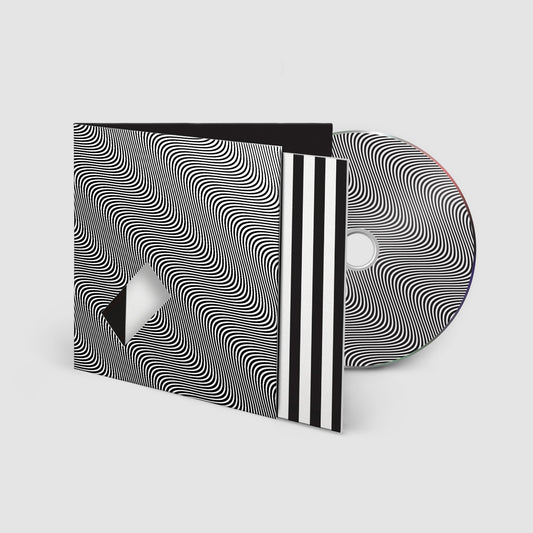Jamie xx “In Waves” CD case with optical illusion cover art.