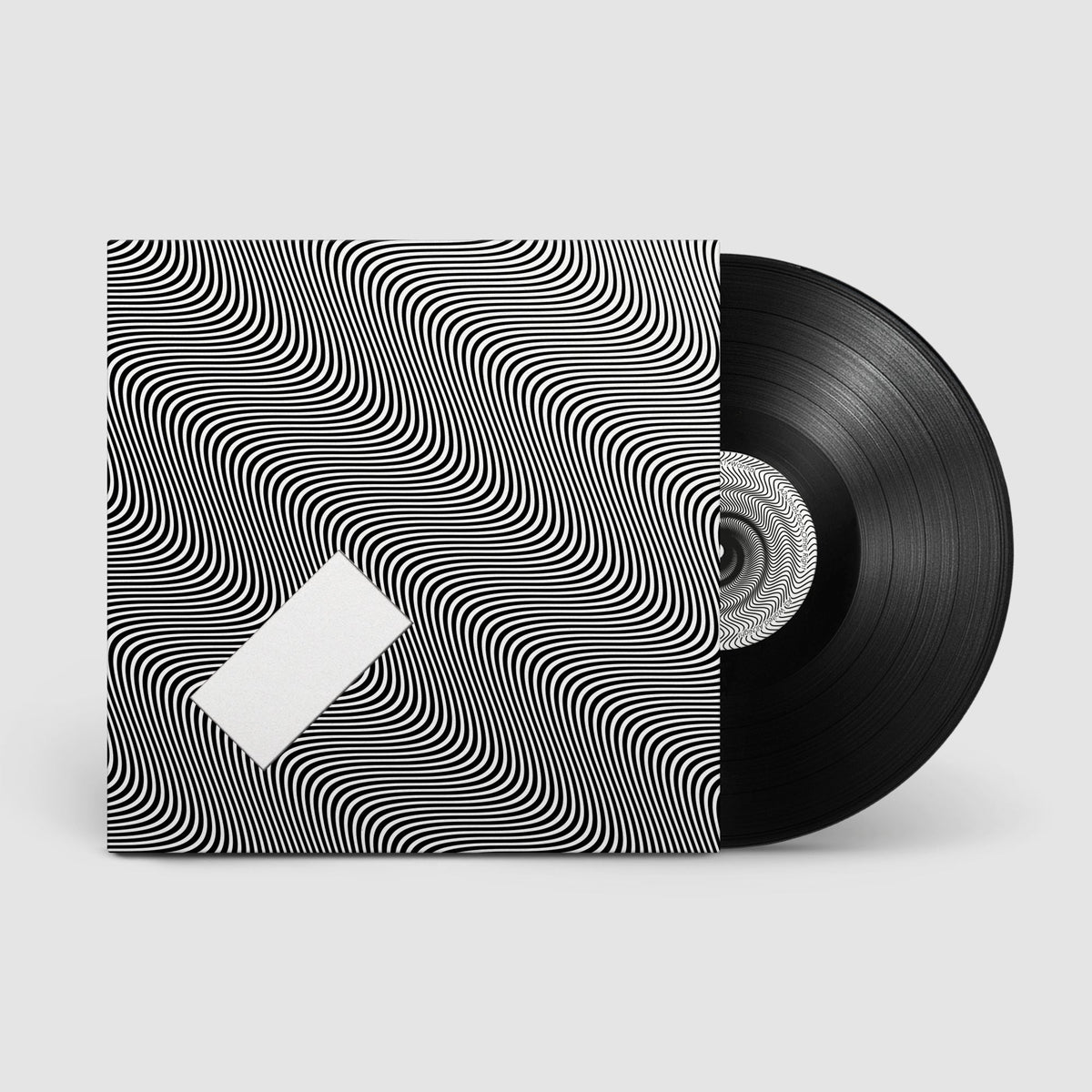 Vinyl record with Jamie xx album In Waves cover art on sleeve packaging.