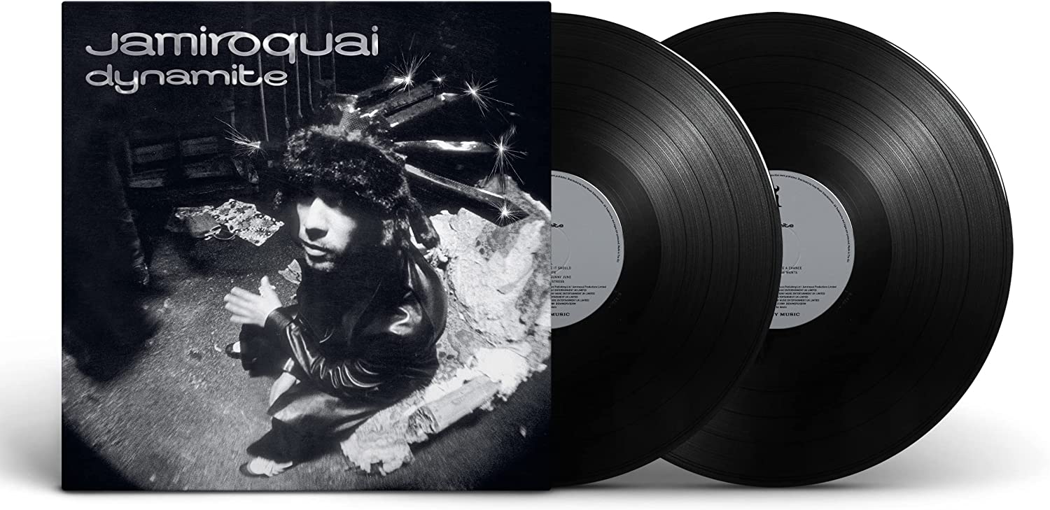 Jamiroquai Dynamite album cover with two black vinyl records displayed next to it.
