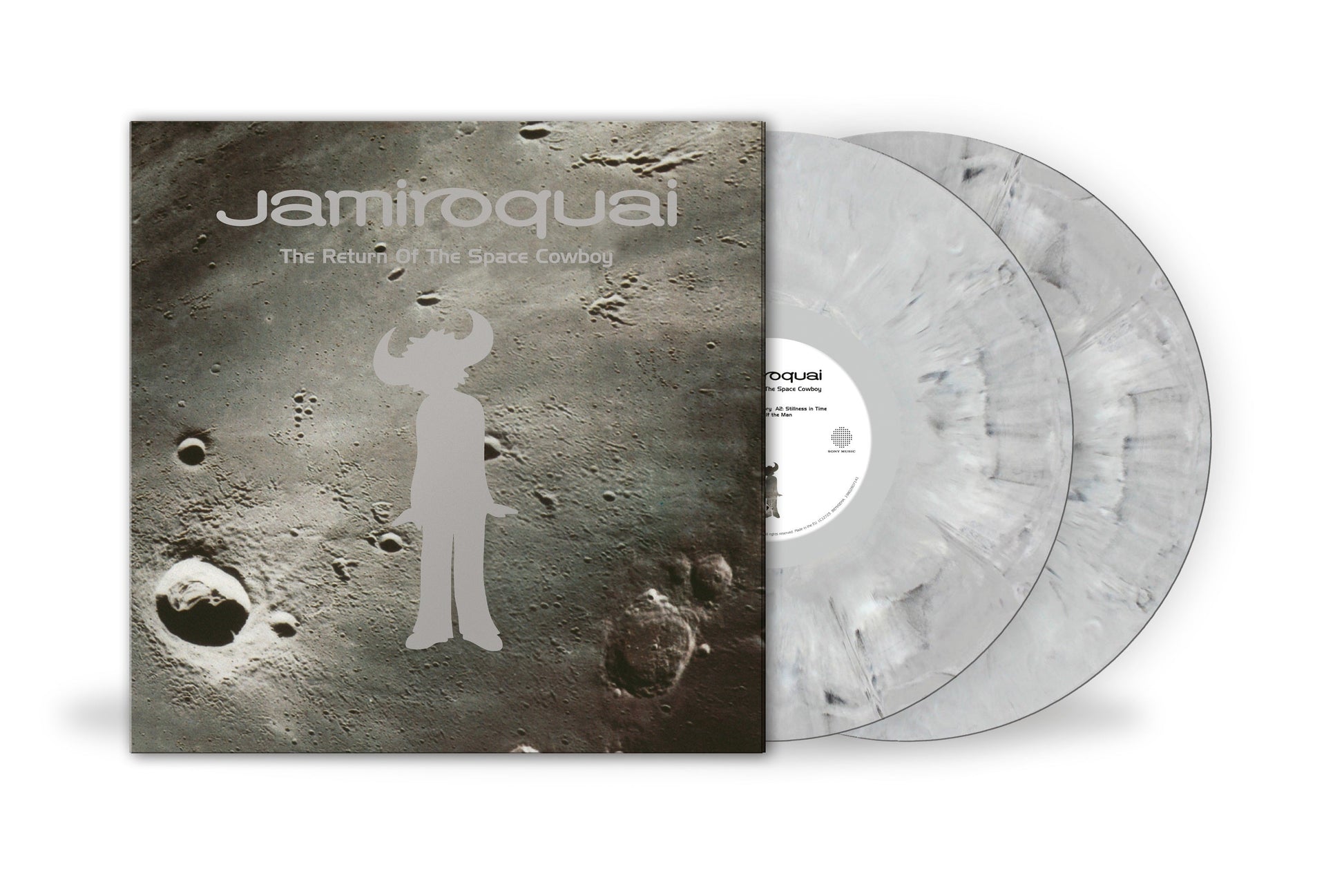 Jamiroquai The Return Of The Space Cowboy vinyl album cover and two marbled discs.