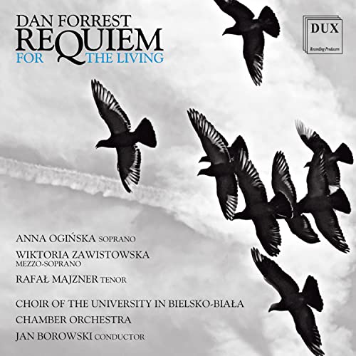 CD cover: black birds flying against a grey, textured sky.