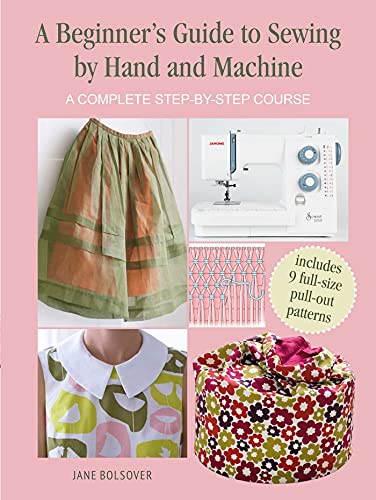 Sewing guide cover with skirt, sewing machine, patterns, and finished projects.
