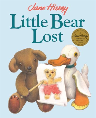 A brown teddy bear and a white toy duck holding a drawing of a bear.