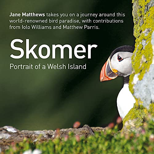 Book cover featuring a close-up of a puffin beside a mossy rock.