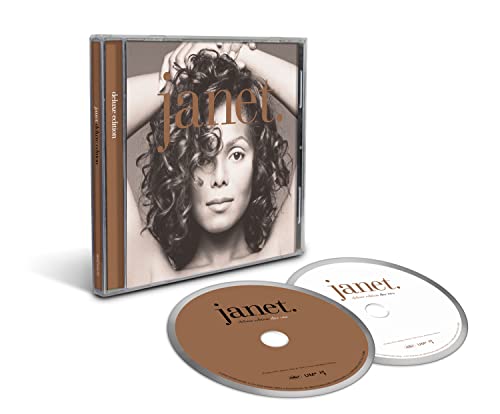 Janet Jackson janet. deluxe edition CD case and two discs on a white background.