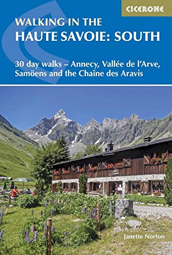 Book cover depicting a mountain chalet with snowy peaks in the background.