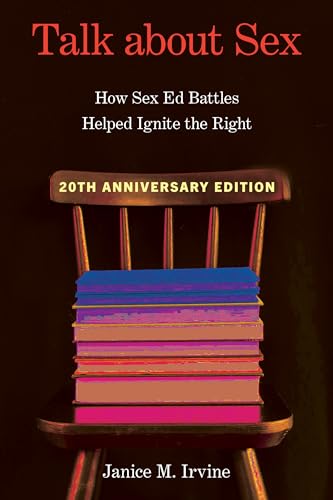 Book cover: “Talk about Sex” stacked on a wooden chair.