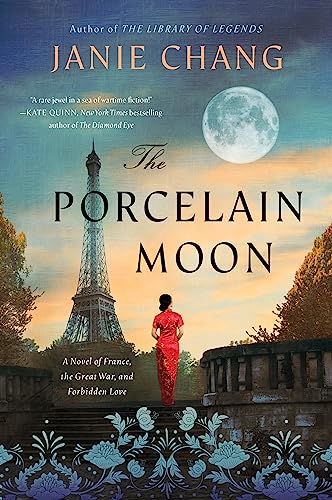 Book cover: Eiffel Tower, woman in red, and a large full moon.