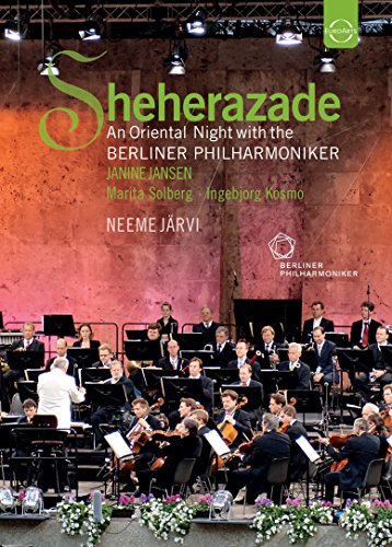Orchestra performing on stage, DVD cover for “Sheherazade” with Janine Jansen.