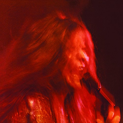 "Vinyl album cover featuring a red-toned image of Janis Joplin singing into a microphone."