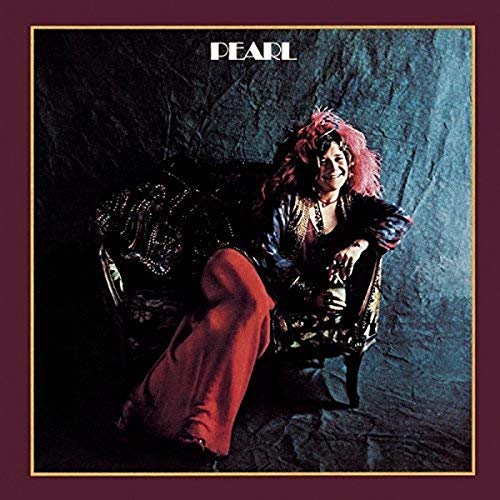 Janis Joplin sits in an ornate chair on the "Pearl" album cover.