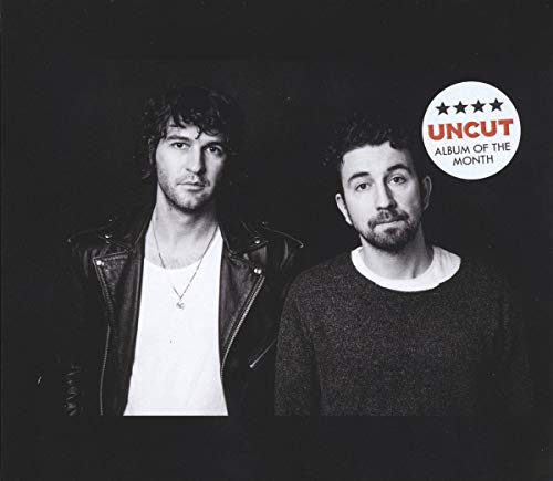 Black and white portrait of two men, album cover with a review sticker.