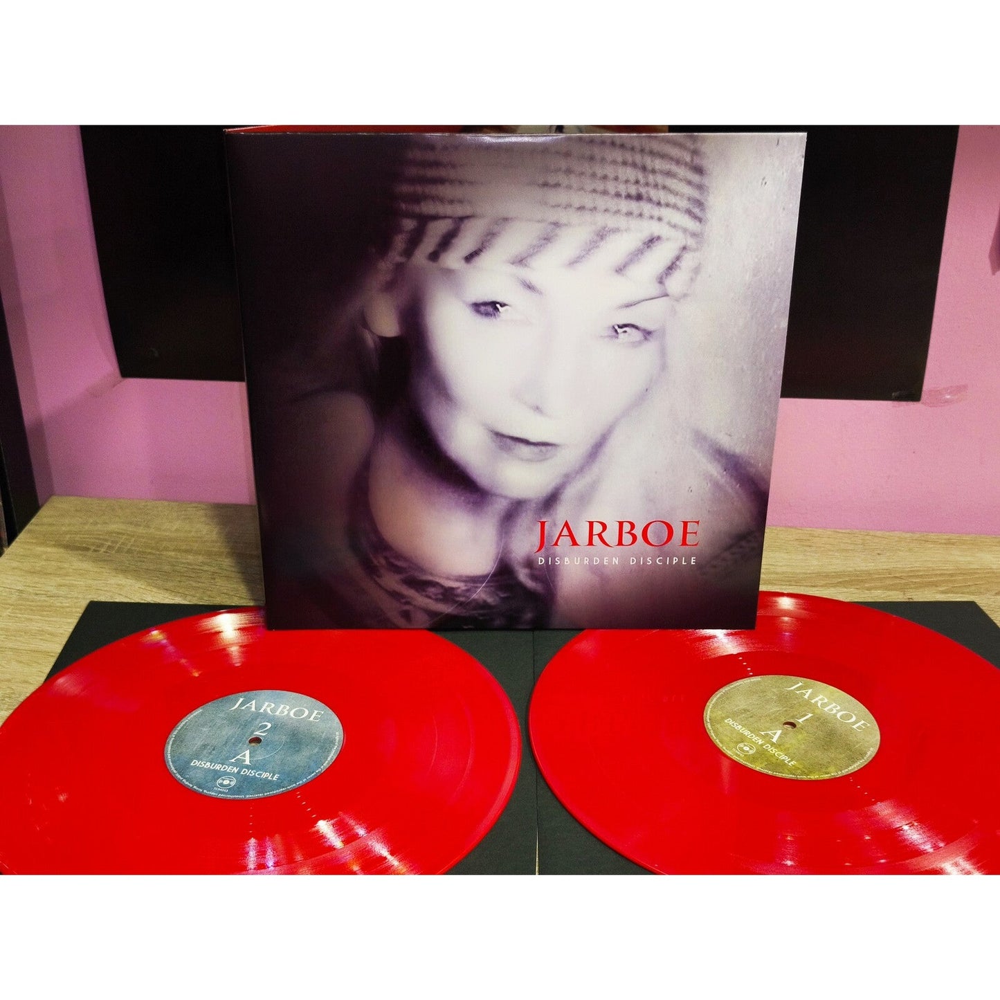 Jarboe album "Disburden Disciple" vinyl with a portrait cover and red records.
