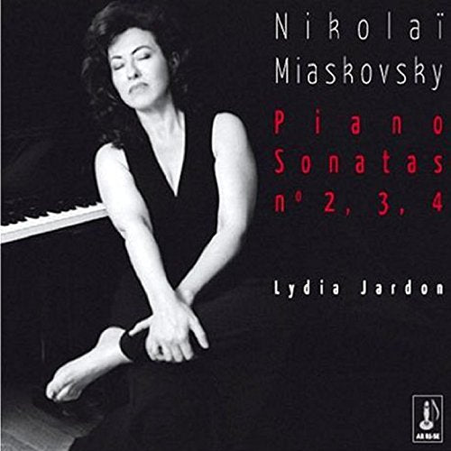 Black and white album cover featuring pianist Lydia Jardon sitting beside a piano.