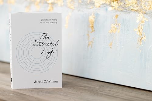 White book cover with circular design, titled "The Storied Life.