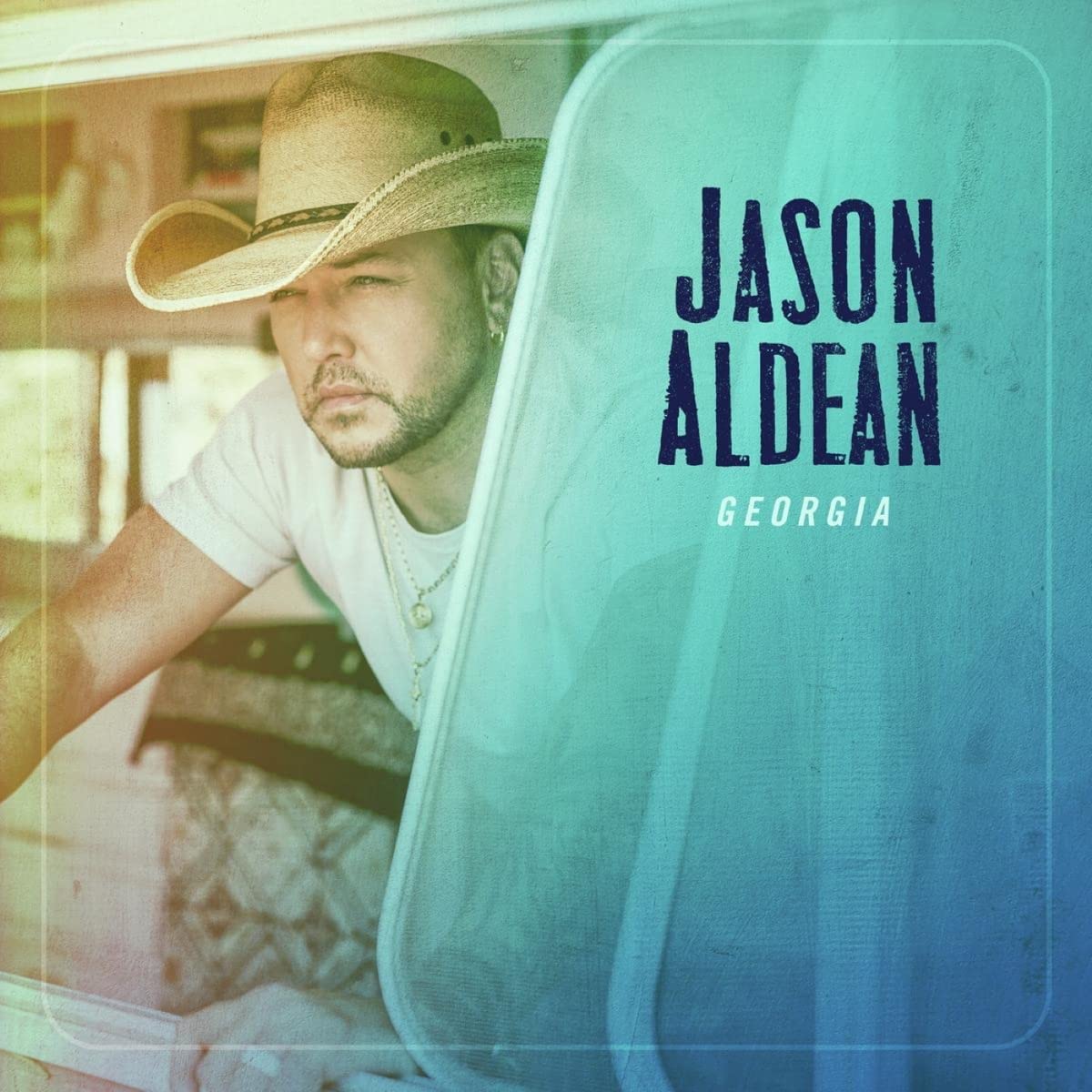 Jason Aldean album cover, featuring a portrait and blue background.