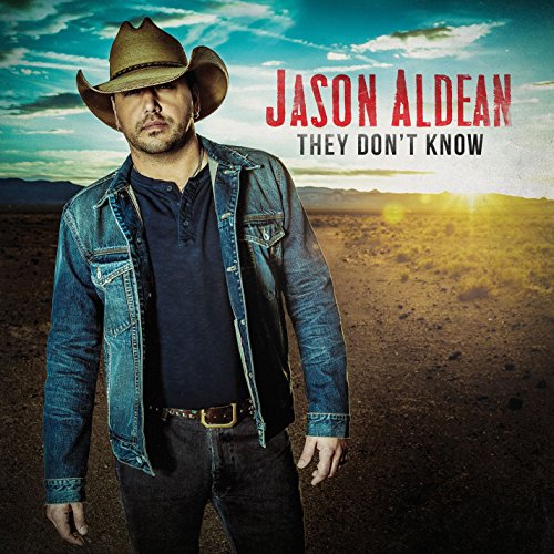 Jason Aldean album cover, man in a cowboy hat, desert background.