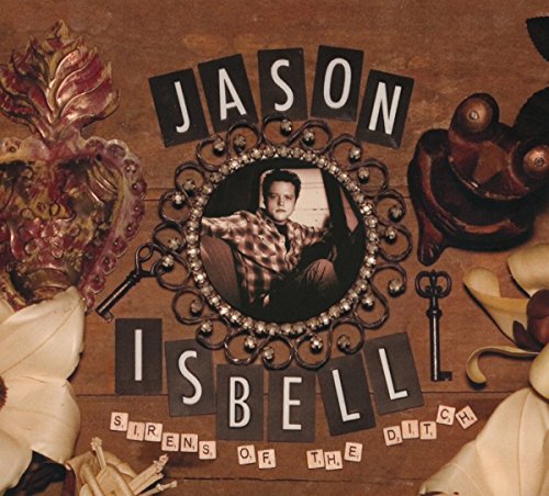Album cover featuring a photo of Jason Isbell in a decorative frame on wood.