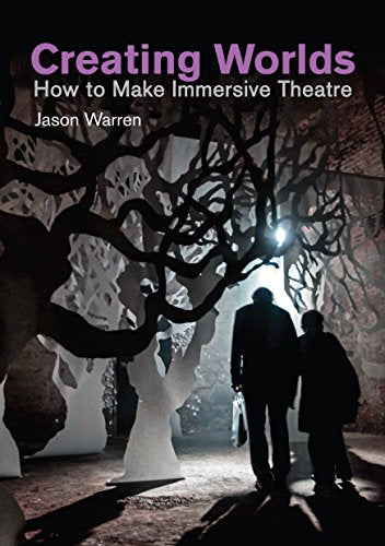 Book cover: "Creating Worlds" with silhouetted figures near abstract trees.