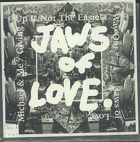 Record sleeve with black and white cityscape and bold, stylized text.