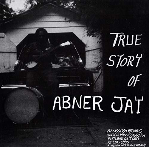 Black and white vinyl record cover featuring a musician with a guitar.