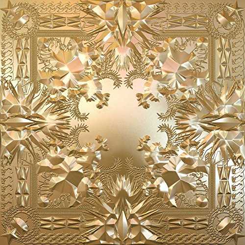 Intricate, metallic gold embossed square pattern with symmetrical geometric and floral designs.