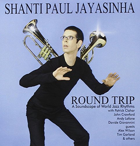 CD cover: Man with trumpets, titled "Shanti Paul Jayasinha - Round Trip".