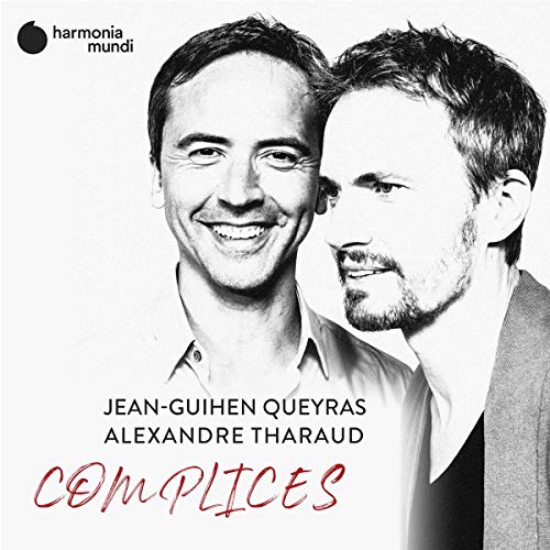 Black and white portrait of two smiling men, Jean-Guihen Queyras and Alexandre Tharaud.