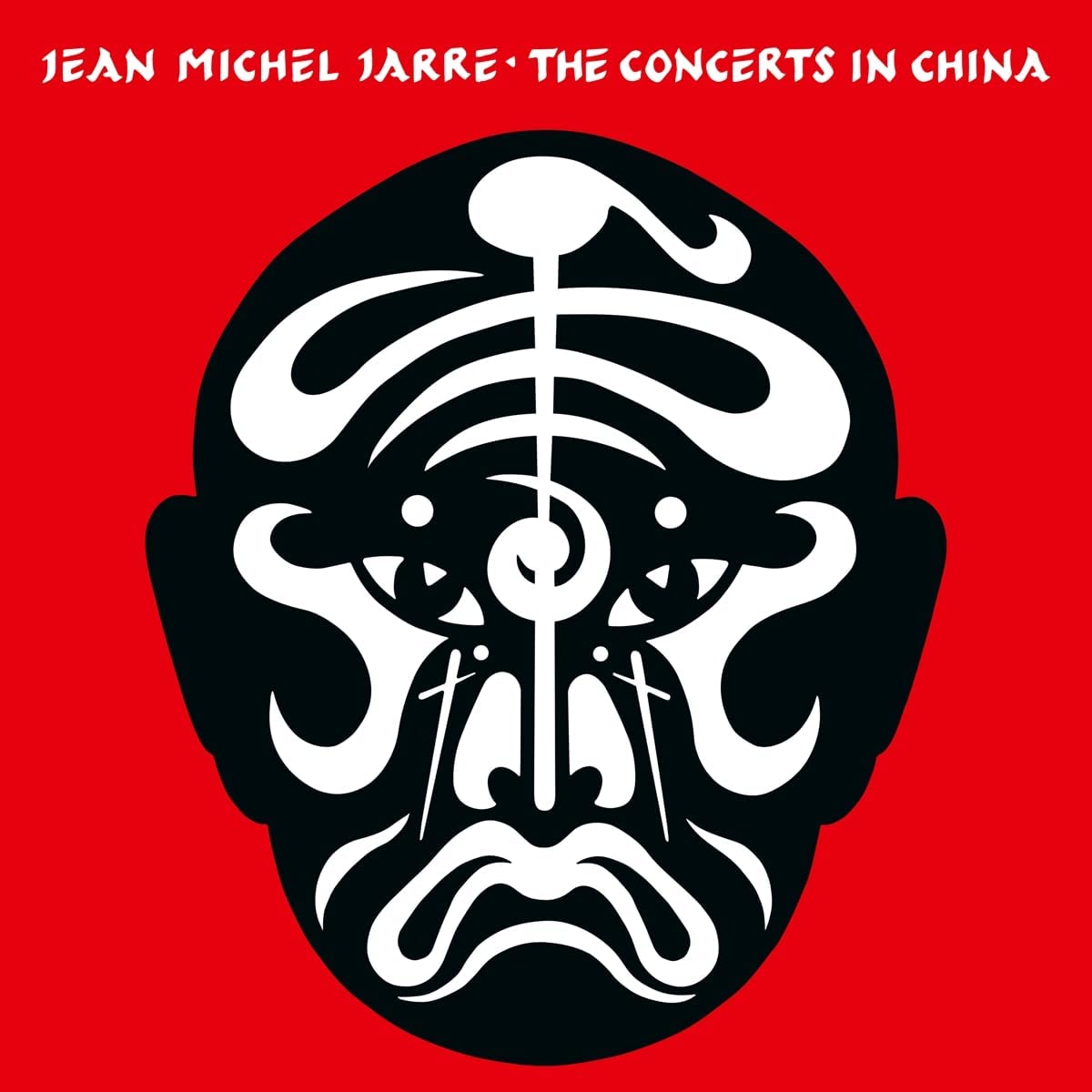 "Red album cover with black and white abstract face graphic and artist's name."