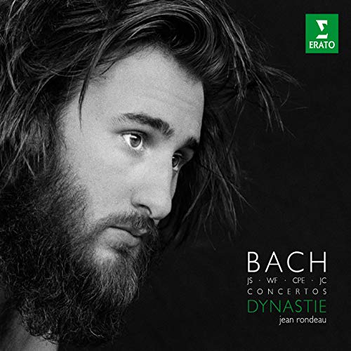 Black and white CD cover featuring a man with long hair and a beard.