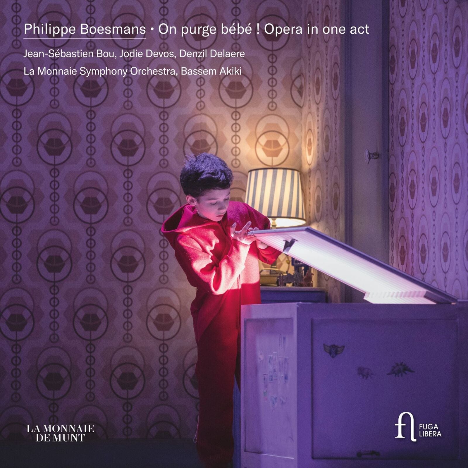 CD cover: a person in red with a glowing box, patterned background.