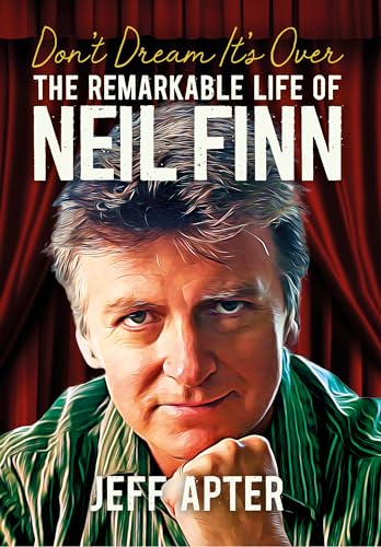 Book cover featuring a portrait of musician Neil Finn against red curtains.
