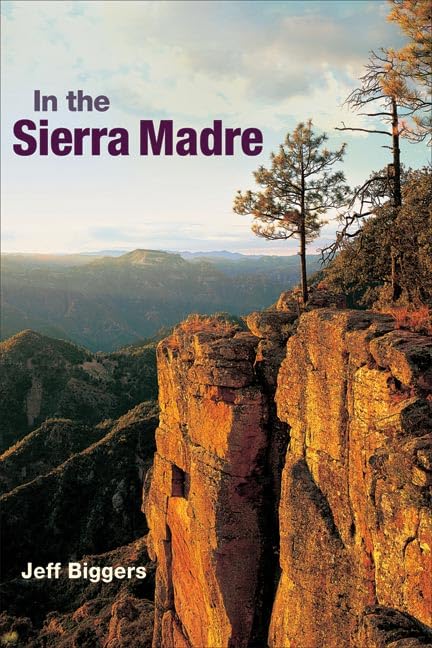 Book cover: rocky cliff overlooking a forested mountain range.
