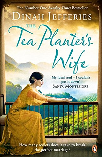 "Woman in yellow dress on balcony overlooking green hills on a book cover."