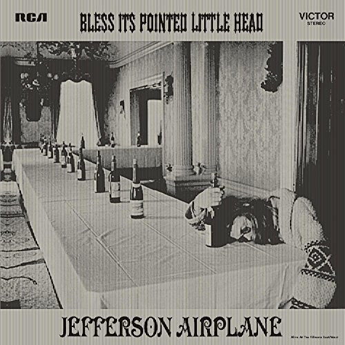 Jefferson Airplane album cover, black and white, surreal room with bottles.