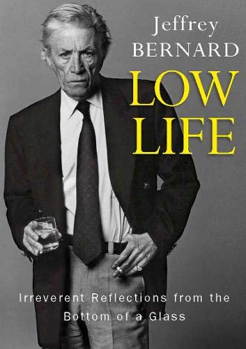 Book cover: portrait of Jeffrey Bernard in a suit, holding a drink.