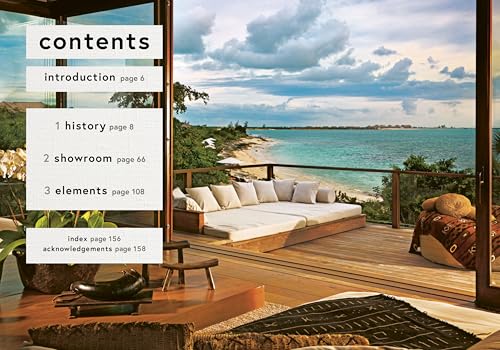 Coastal interior design book cover with a beach view and sofa.